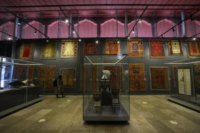 Antique Ottoman carpets displayed on the walls of the Turkish and Islamic Arts Museum